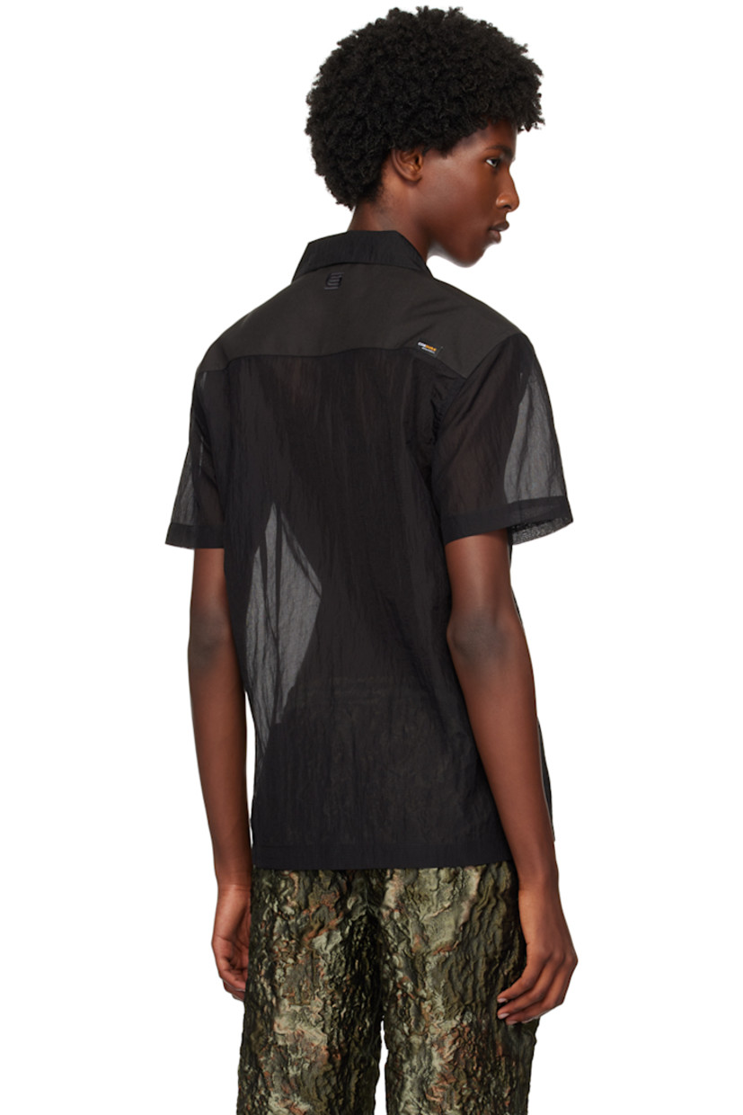 Sheer CORDURA® nylon ripstop and canvas shirt. 

· Paneled construction 
· Button tab at open spread collar 
· Button closure
· Patch pocket
· Logo embroidered at back collar
· Logo patch at back yoke

Supplier color: Black