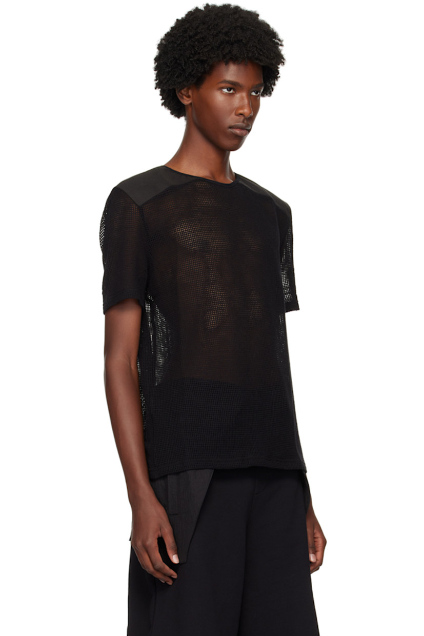 Nylon mesh and canvas T-shirt. 

· Paneled construction 
· Crewneck
· Logo embroidered at back collar
· Logo flag at back yoke

Supplier color: Black