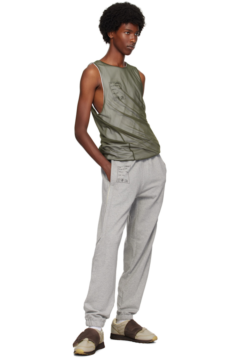 Stretch cotton jersey and nylon organza tank top.
 
· Crewneck
· Logo graphic printed at chest
· Ruching at hem

Supplier color: Green/White