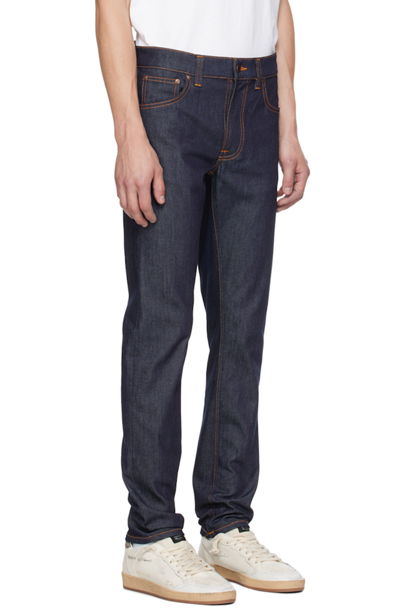 Slim-fit tapered 11.5 oz stretch organic cotton denim jeans. 

· Mid-rise 
· Belt loops 
· Five-pocket styling 
· Zip-fly 
· Jacron logo patch at back waistband 
· Logo patch at back pocket
· Logo-engraved antiqued copper-tone hardware
· Contrast stitching in tan 

Supplier color: Dry 16 dips