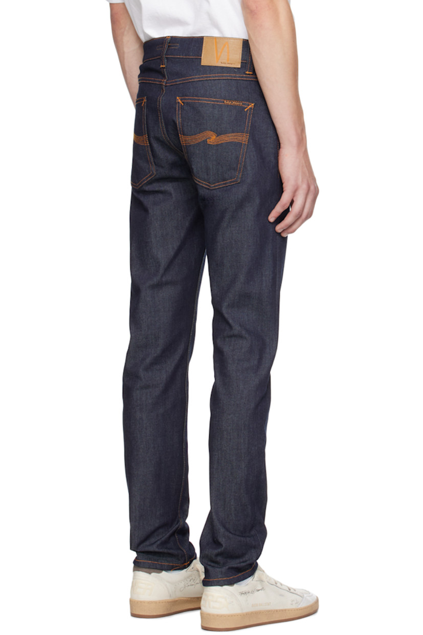 Slim-fit tapered 11.5 oz stretch organic cotton denim jeans. 

· Mid-rise 
· Belt loops 
· Five-pocket styling 
· Zip-fly 
· Jacron logo patch at back waistband 
· Logo patch at back pocket
· Logo-engraved antiqued copper-tone hardware
· Contrast stitching in tan 

Supplier color: Dry 16 dips