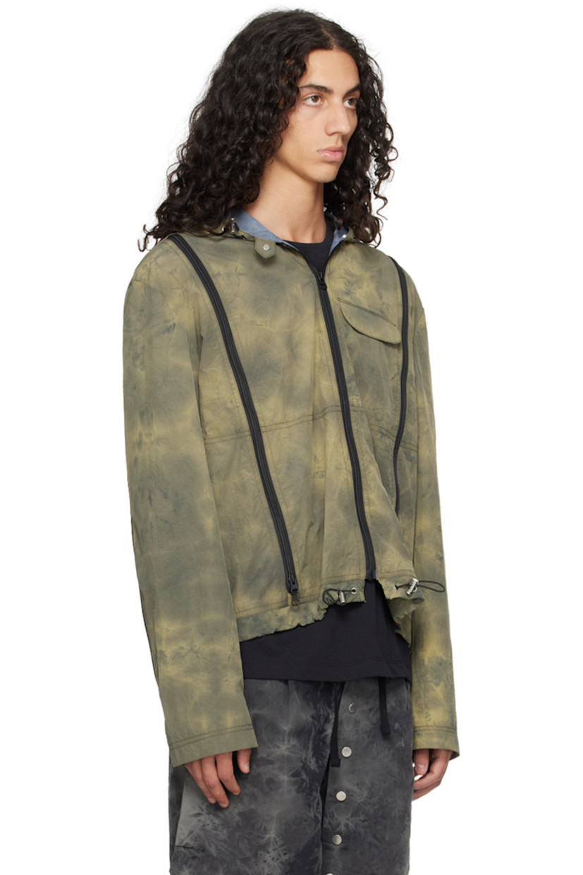 Crinkled nylon taffeta jacket. Two-way zip vents and tie-dye effect throughout.

· Bungee-style drawstring at hood and hem
· Press-stud tab at hood
· Zip closure
· Flap pocket
· Press-stud tab at cuffs
· Full mesh lining

Supplier color: Stega