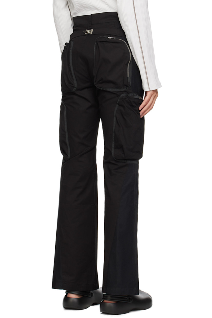 Cotton twill and polyester mesh cargo pants.

· Paneled construction
· Belt loops
· Four-pocket styling
· Zip-fly
· Zip pocket at outseams
· Flip-clasp strap at back

Supplier color: Black