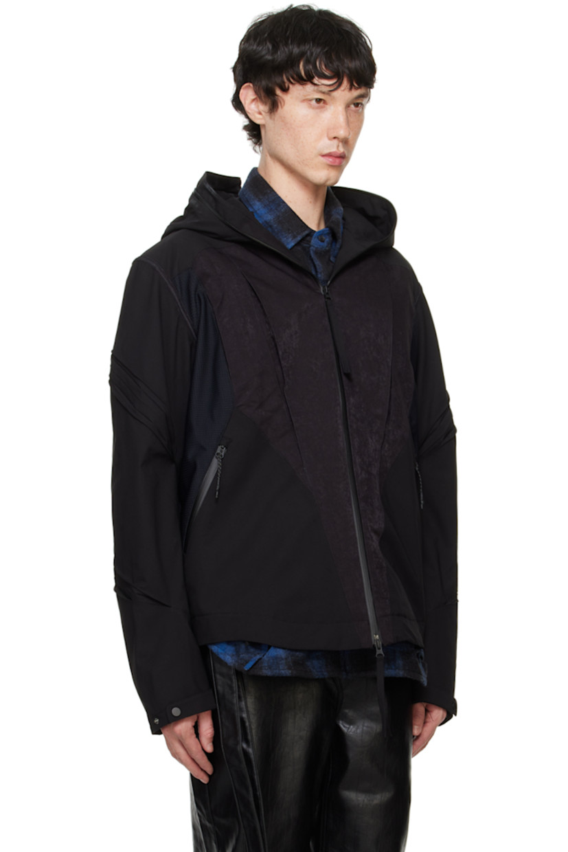 Polyester taffeta, polyester- and nylon-blend sateen, and stretch nylon ripstop jacket. Inverted pleats throughout.

· Paneled construction
· Press-stud fastening at brimmed hood
· Two-way zip closure extends to hood
· Funnel neck
· Zip pockets
· Concealed bungee-style drawstring at curved hem
· Press-stud tab at cuffs
· Zip pocket at interior
· Full fleece lining

Supplier color: Black
