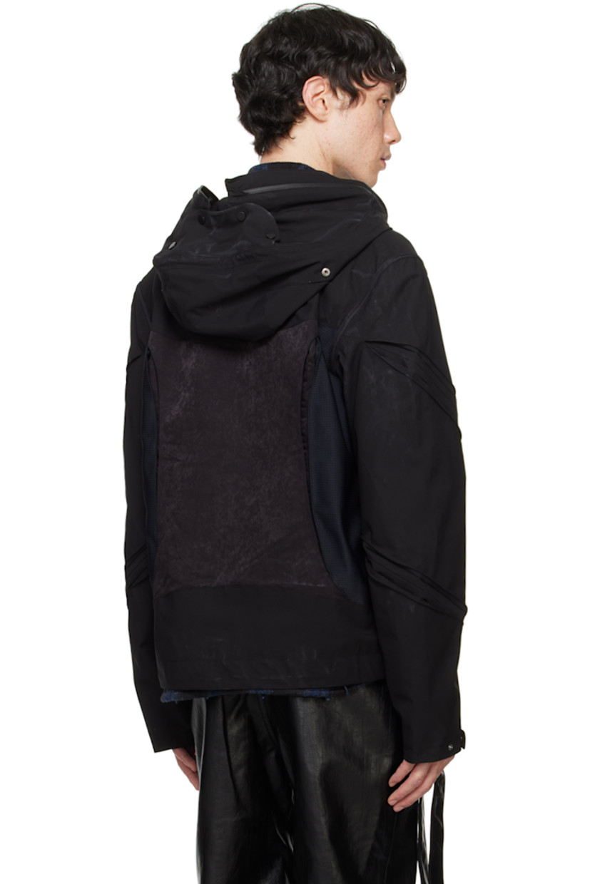 Polyester taffeta, polyester- and nylon-blend sateen, and stretch nylon ripstop jacket. Inverted pleats throughout.

· Paneled construction
· Press-stud fastening at brimmed hood
· Two-way zip closure extends to hood
· Funnel neck
· Zip pockets
· Concealed bungee-style drawstring at curved hem
· Press-stud tab at cuffs
· Zip pocket at interior
· Full fleece lining

Supplier color: Black