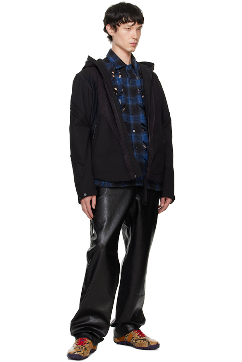 Polyester taffeta, polyester- and nylon-blend sateen, and stretch nylon ripstop jacket. Inverted pleats throughout.

· Paneled construction
· Press-stud fastening at brimmed hood
· Two-way zip closure extends to hood
· Funnel neck
· Zip pockets
· Concealed bungee-style drawstring at curved hem
· Press-stud tab at cuffs
· Zip pocket at interior
· Full fleece lining

Supplier color: Black