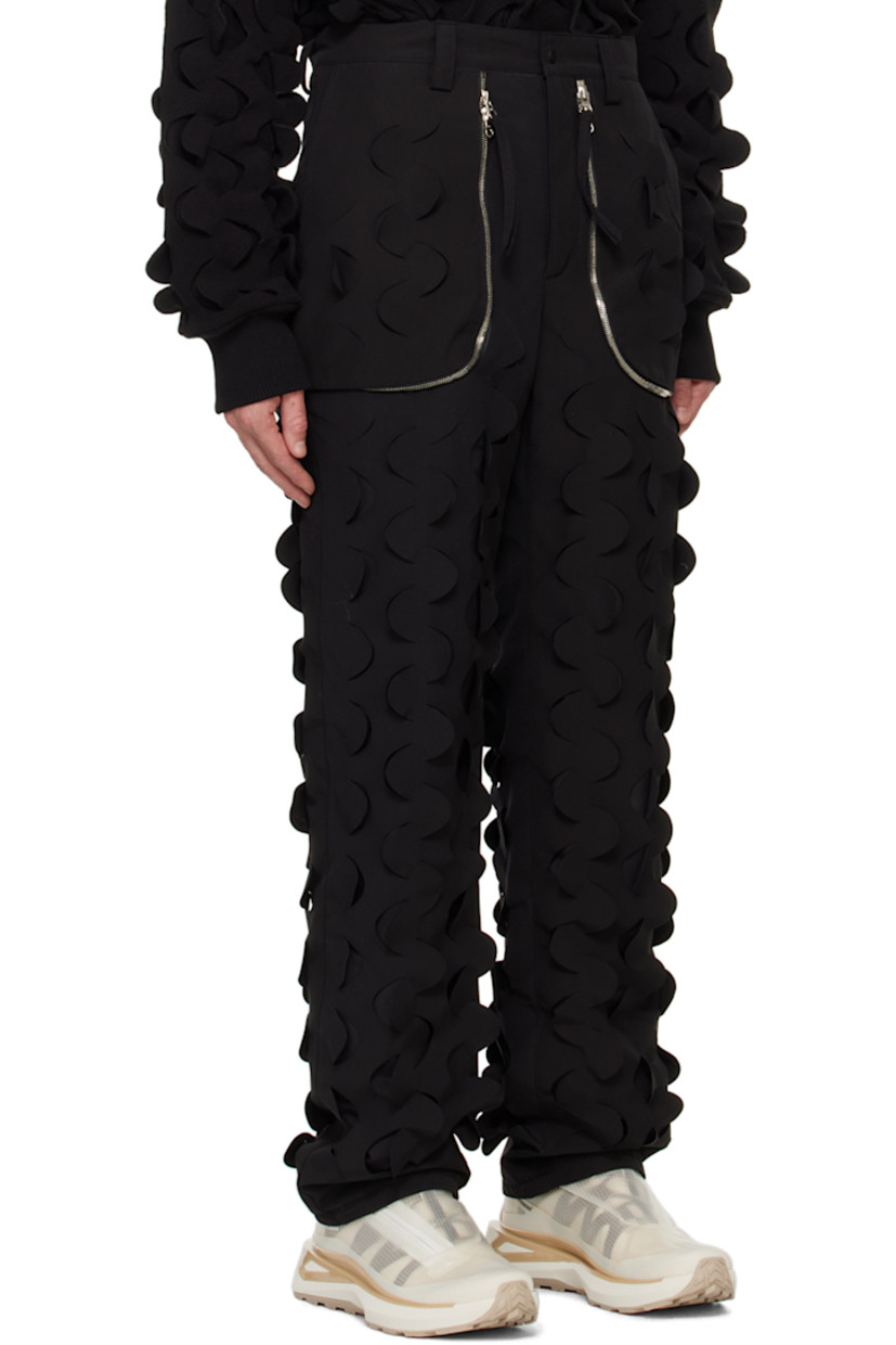 Padded plain-woven polyester- and cotton-blend trousers. Laser-cut detailing throughout.

· Belt loops
· Four-pocket styling
· Zip-fly
· Two-way zip vents at front
· Full plain-woven lining

Supplier color: Black