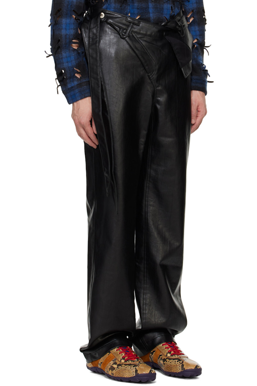 Crinkled faux-leather trousers. 

· Wrap construction
· Belt loops
· Integrated self-tie straps at waistband
· Four-pocket styling
· Offset zip-fly
· Logo patch at back waistband 
· Full plain-woven lining

Supplier color: Black