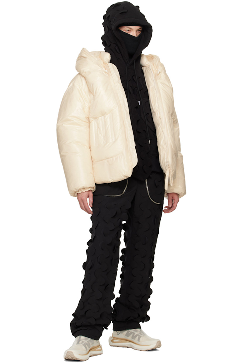 Double-faced polyester fleece hoodie. Laser-cut detailing throughout.

· Drawstring at hood
· Patch pockets
· Logo flag at chest
· Dropped shoulders
· Partial rib knit hem and cuffs

Supplier color: Black