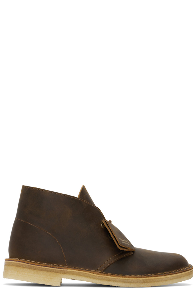 Ankle-high waxed leather desert boots in brown. 

· Logo tags at lace-up closure
· Breathable grained leather lining
· Topstitching at welt
· EVA rubber midsole
· Crepe rubber sole

Supplier color: Beeswax