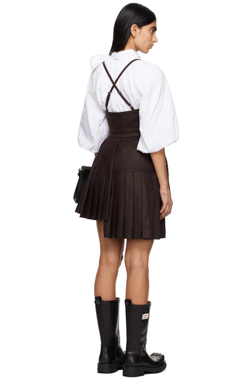 Wool-blend twill minidress.

· Pleats throughout
· Wrap construction
· Square neck
· Underwire at cups
· Pin-buckle straps at overlay
· Intarsia-knit panel at front

Supplier color: Brown