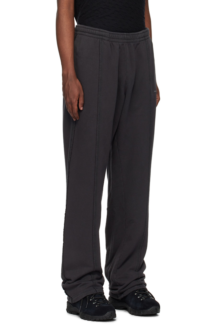 Heavyweight cotton fleece sweatpants. Garment-dyed. 

· Concealed drawstring at elasticized waistband 
· Two-pocket styling 
· Central seams at front
· Logo printed at leg 

Supplier color: Washed Black