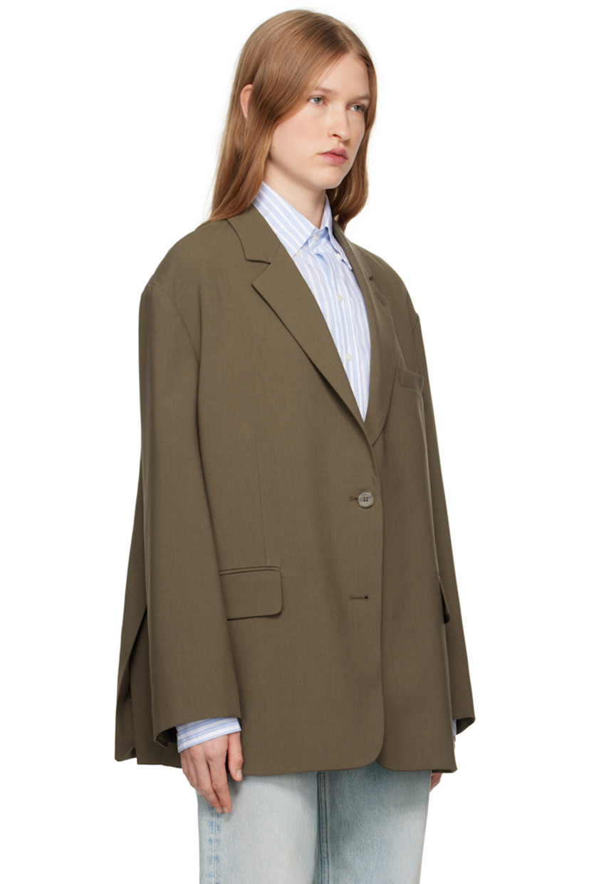 Oversized stretch polyester twill blazer.

· Notched lapel
· Two-button closure
· Welt pocket and flap pockets
· Dropped shoulders
· Four-button surgeon's cuffs
· Twin vents at back hem
· Full satin lining
· Logo-engraved hardware

Supplier color: Chocolate