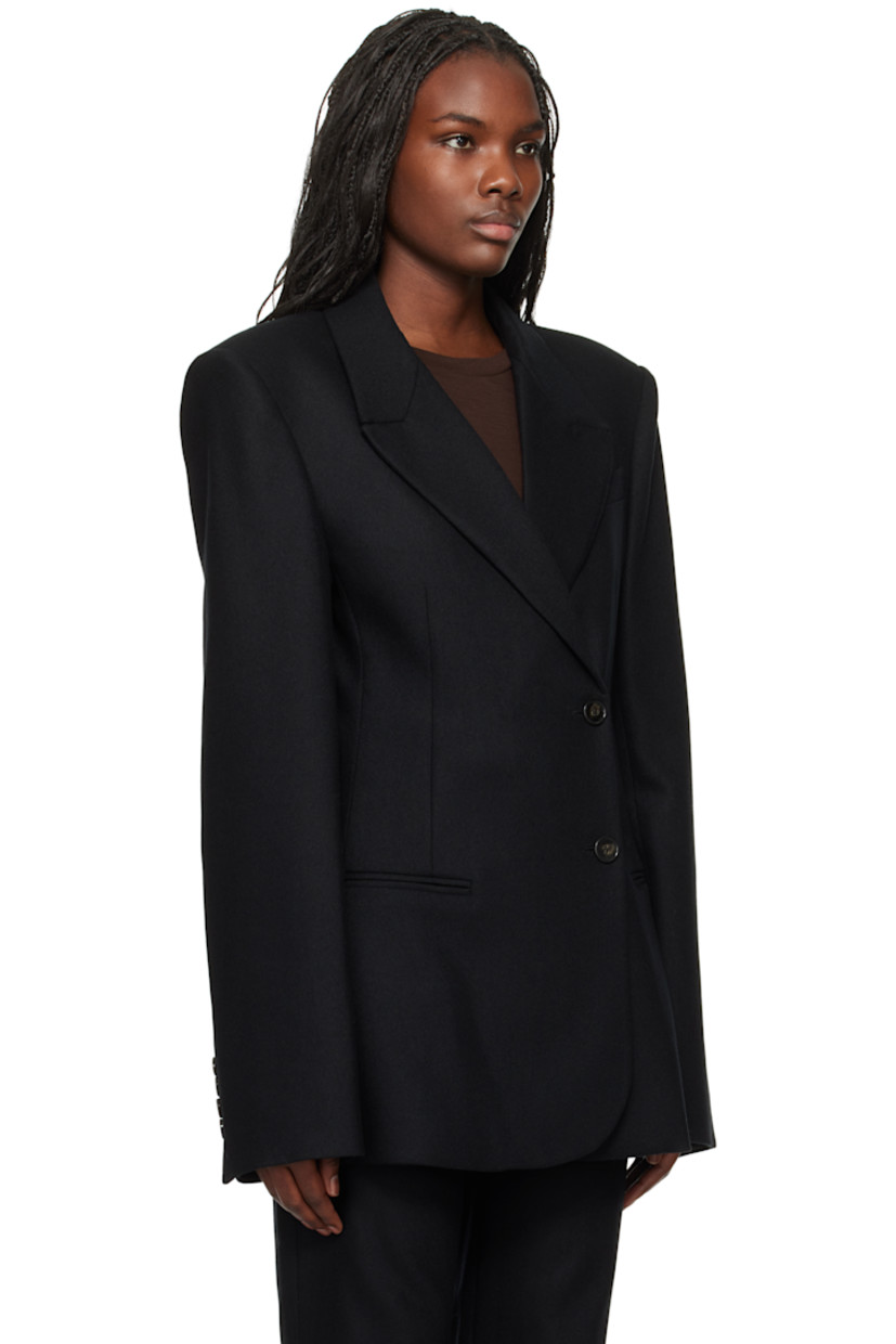 Stretch plain-woven virgin wool blazer.

· Slim-fit
· Peaked lapel
· Double-breasted button closure
· Darts at front and back
· Mock welt pocket at chest
· Welt pockets at waist
· Padded shoulders
· Four-button surgeon's cuffs
· Full satin lining

Supplier color: Black