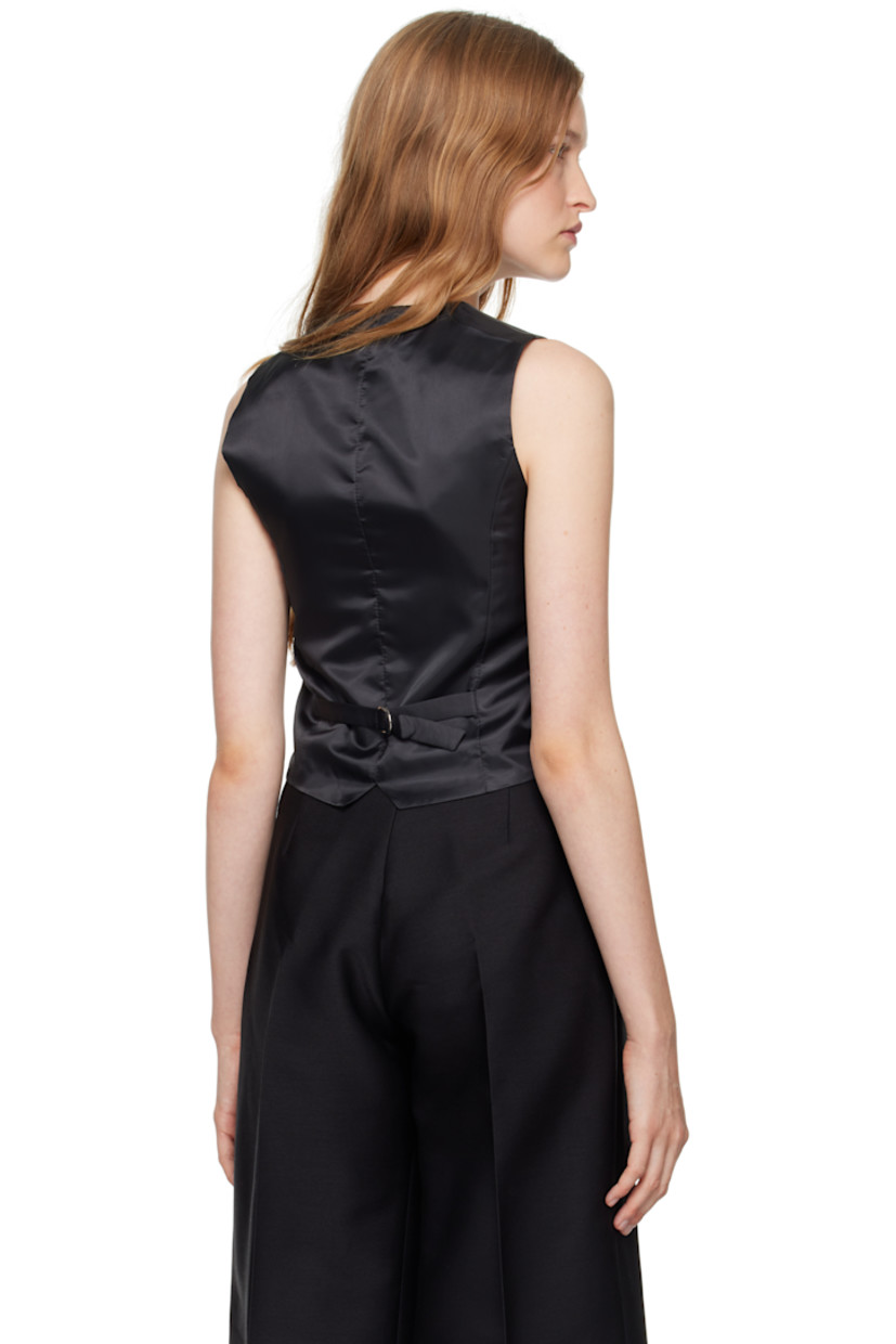 TENCEL™ lyocell- and wool-blend broadcloth vest.

· Y-neck
· Button closure
· Welt pockets
· Cinch tab at back
· Full satin lining
· Horn hardware

Supplier color: Dark grey