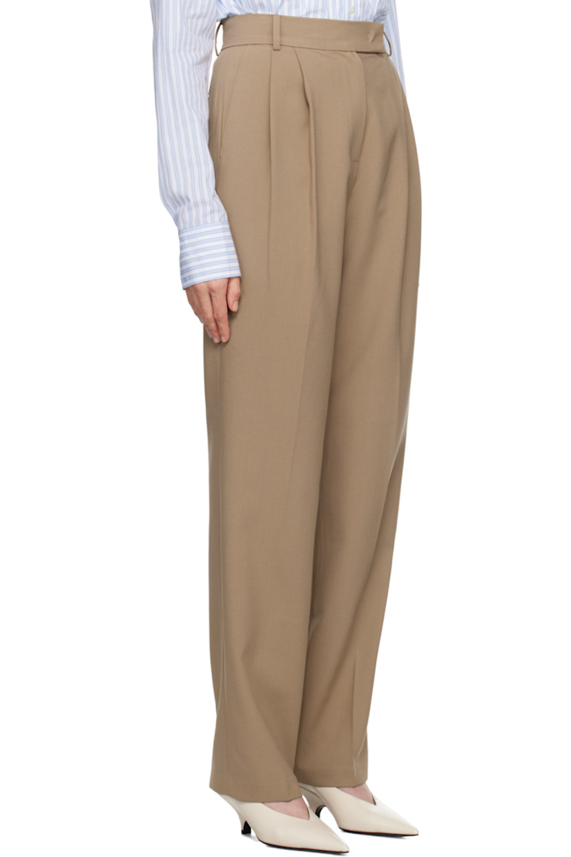 Relaxed-fit and straight-leg stretch polyester broadcloth trousers.

· Belt loops
· Four-pocket styling
· Zip-fly
· Pleats at front
· Creased legs
· Darts at back
· Horn hardware

Supplier color: Latte