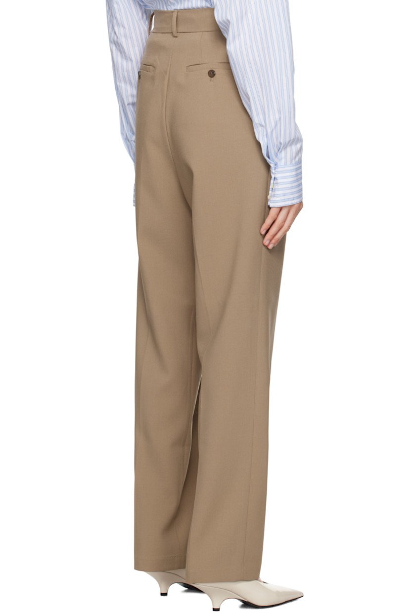Relaxed-fit and straight-leg stretch polyester broadcloth trousers.

· Belt loops
· Four-pocket styling
· Zip-fly
· Pleats at front
· Creased legs
· Darts at back
· Horn hardware

Supplier color: Latte