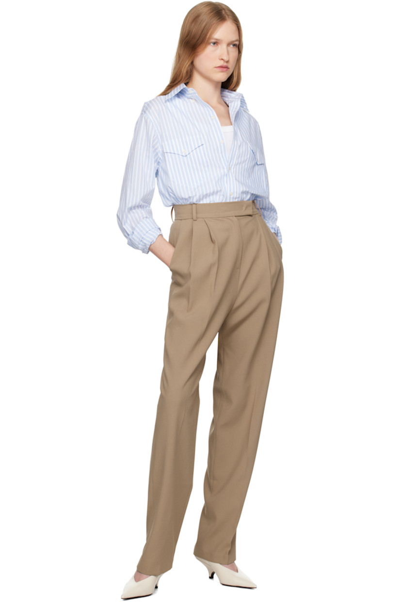 Relaxed-fit and straight-leg stretch polyester broadcloth trousers.

· Belt loops
· Four-pocket styling
· Zip-fly
· Pleats at front
· Creased legs
· Darts at back
· Horn hardware

Supplier color: Latte