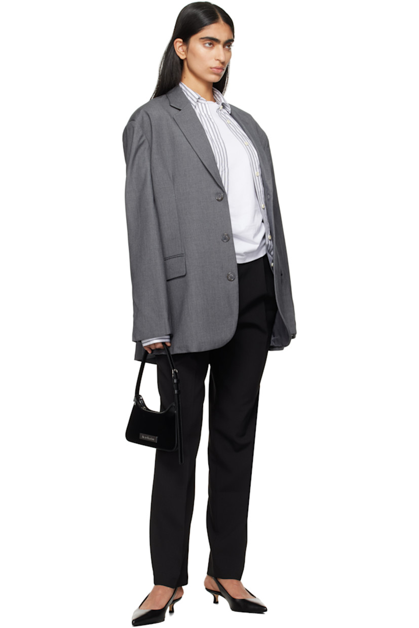 Relaxed-fit and straight-leg stretch polyester barathea trousers.

· Belt loops
· Four-pocket styling
· Zip-fly
· Pleats at front 
· Creased legs
· Unfinished hem

Supplier color: Black