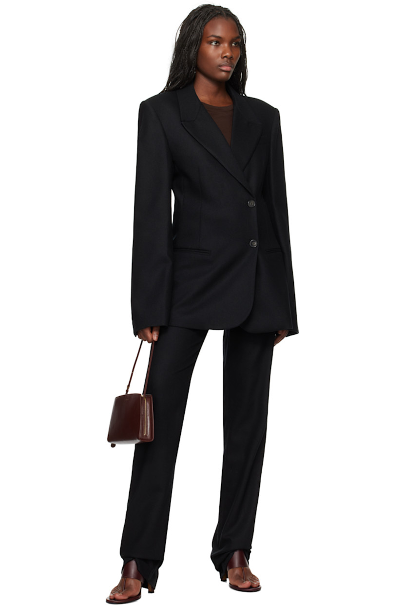 Slim-fit and straight-leg plain-woven stretch virgin wool trousers.

· Lightweight
· High-rise
· Single-pocket styling
· Zip-fly
· Darts at front

Supplier color: Black