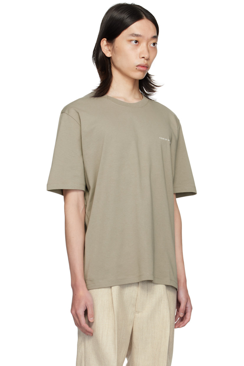 Cotton jersey T-shirt. 

· Rib knit crewneck 
· Logo bonded at chest 

Supplier color: Rock beige