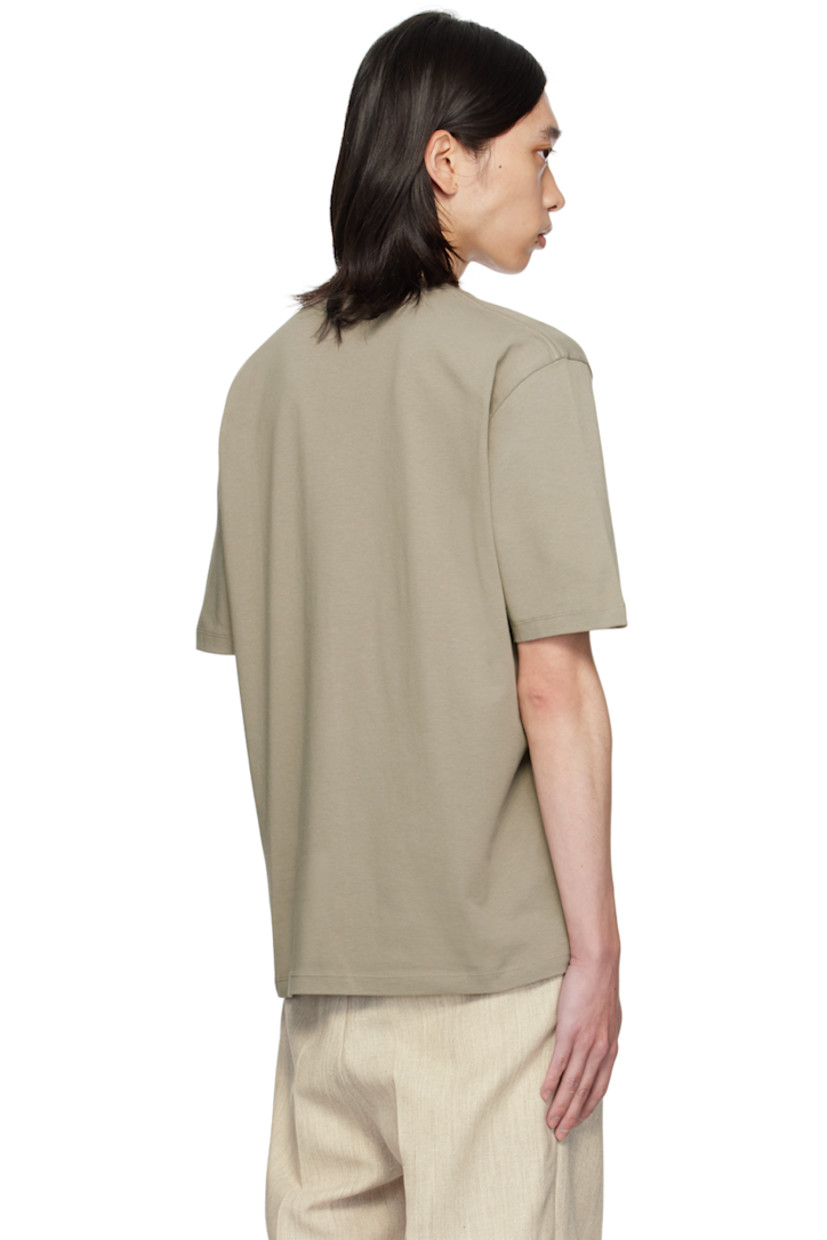 Cotton jersey T-shirt. 

· Rib knit crewneck 
· Logo bonded at chest 

Supplier color: Rock beige