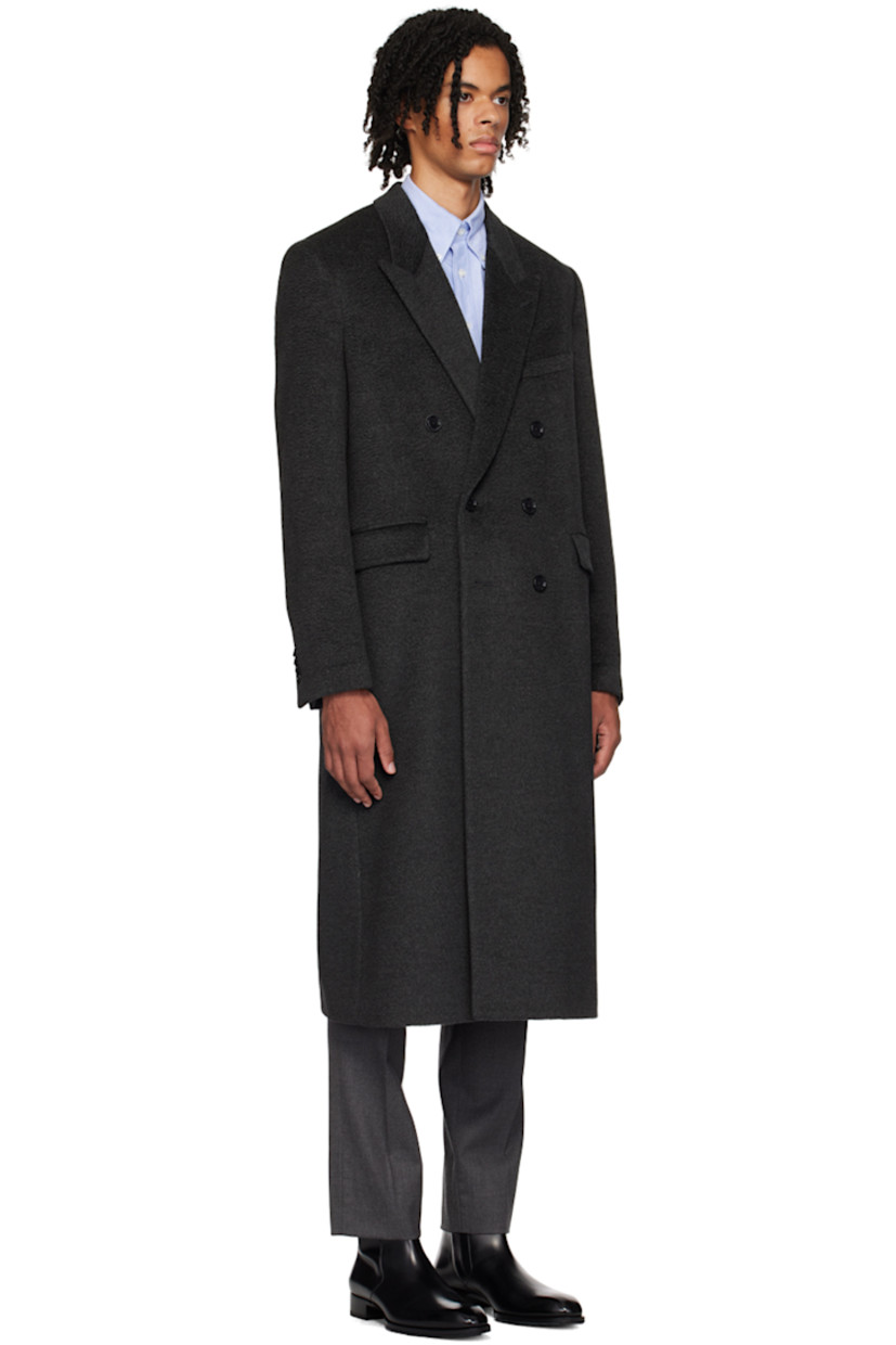 Virgin wool- and alpaca blend twill coat.

· Peaked lapel
· Double-breasted button closure
· Welt pockets
· Four-button surgeon's cuffs
· Central vent at back hem
· Welt pockets at interior 
· Full viscose-blend satin lining

Supplier color: Black