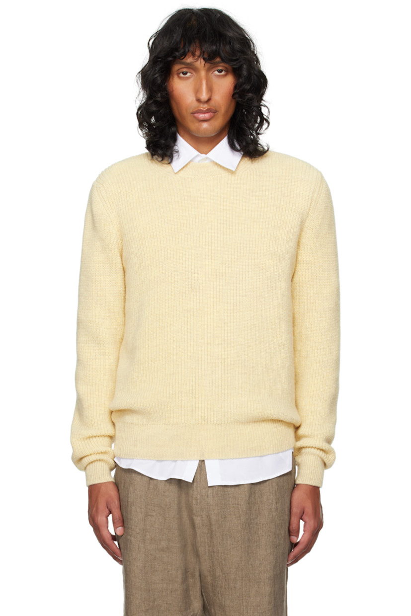 Rib-knit wool sweater. Rib-knit crewneck, hem, and cuffs.

Supplier color: Natural ecru
