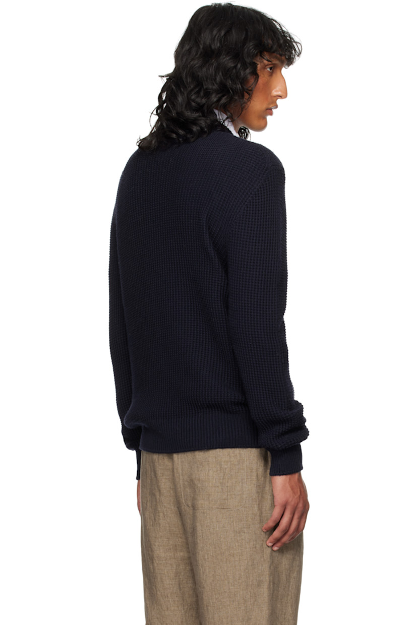 Knit merino wool sweater. Rib-knit mock neck, hem and cuffs.

Supplier color: Light navy