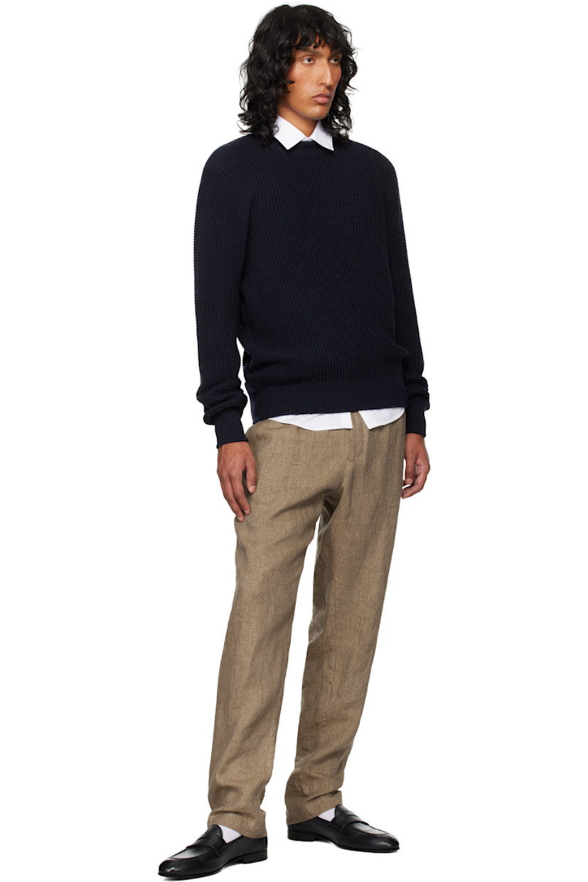 Knit merino wool sweater. Rib-knit mock neck, hem and cuffs.

Supplier color: Light navy