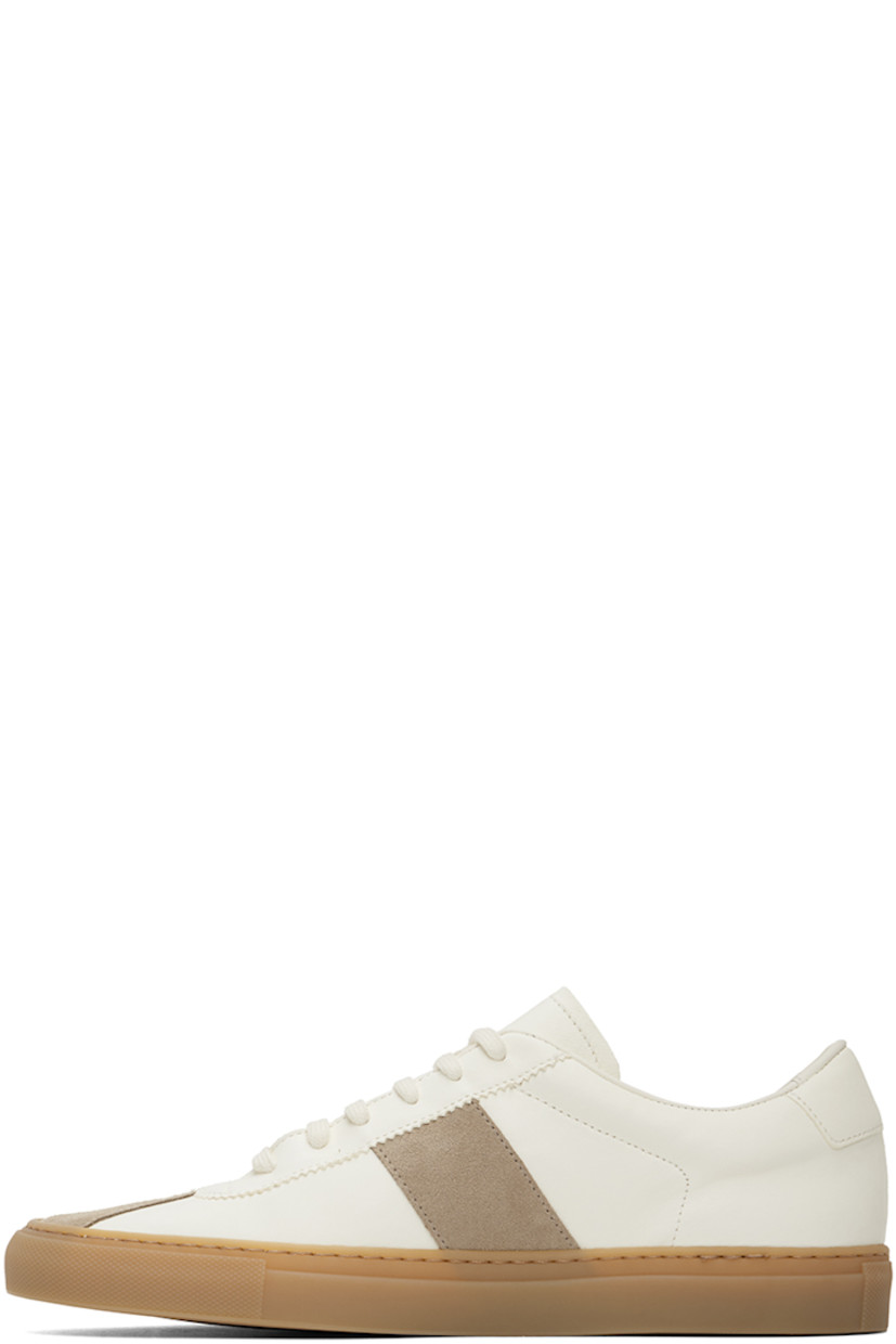 Low-top buffed lambskin and calfskin suede sneakers in off-white.

· Serrated detailing at lace-up closure
· Padded collar
· Signature series stamp at outer side
· Buffed sheepskin and suede lining
· Treaded rubber sole

Supplier color: Off white