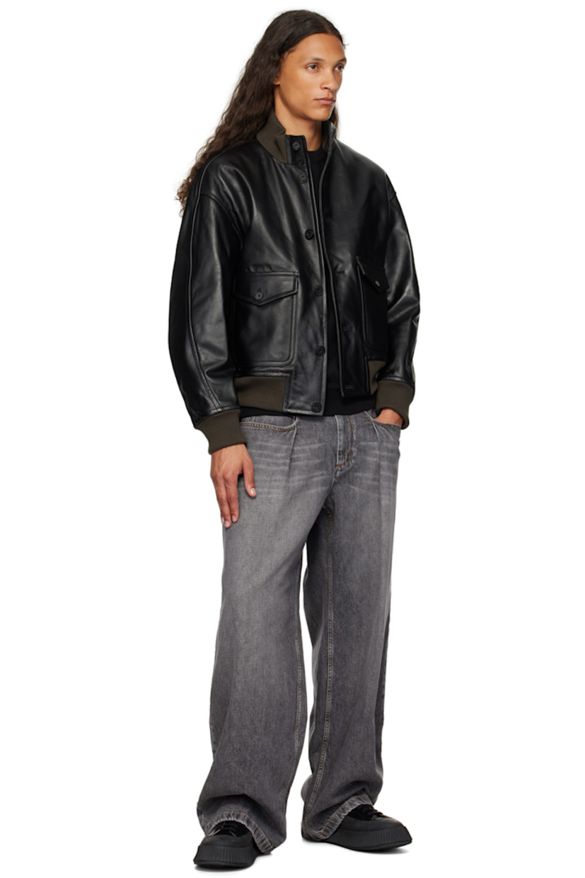 Padded grained leather jacket.

· Rib knit stand collar, hem, and cuffs
· Button closure
· Flap pockets
· Patch pocket at interior 
· Full quilted twill lining

Supplier color: Black