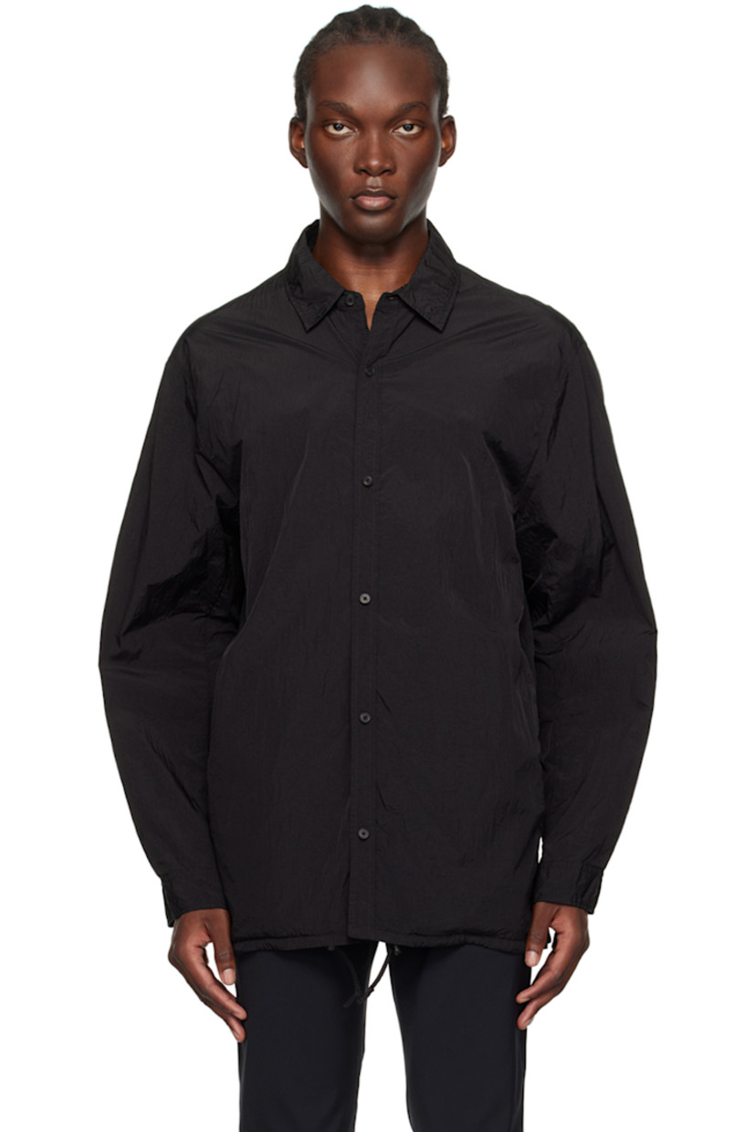 Hand-dyed crinkled nylon taffeta jacket. 

· Spread collar
· Button closure
· Concealed bungee-style drawstring at hem
· Seam pockets
· Dropped shoulders 
· Single-button barrel cuffs
· Unlined

Supplier color: Black