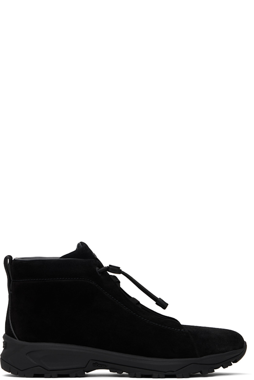 High-top suede sneakers in black.

· Elasticized criss-crossing straps at vamp
· Bungee-style drawstring closure
· Logo bonded at padded tongue
· Padded collar
· Pull-loop at heel tab
· Logo embossed at heel
· Buffed leather lining
· Treaded Vibram® Arctic Grip rubber sole

Supplier color: Black