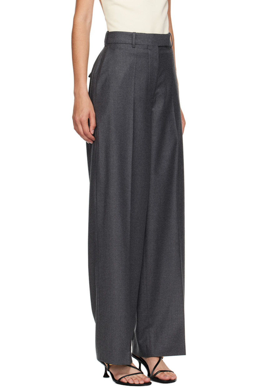 Lightweight wide-leg virgin wool broadcloth trousers.

· Belt loops
· Four-pocket styling
· Zip-fly
· Central crease at front and back 
· Partial viscose twill lining

Supplier color: Dark grey melange