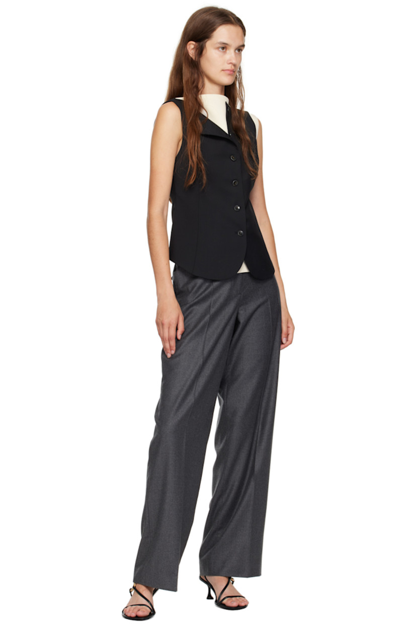 Lightweight wide-leg virgin wool broadcloth trousers.

· Belt loops
· Four-pocket styling
· Zip-fly
· Central crease at front and back 
· Partial viscose twill lining

Supplier color: Dark grey melange