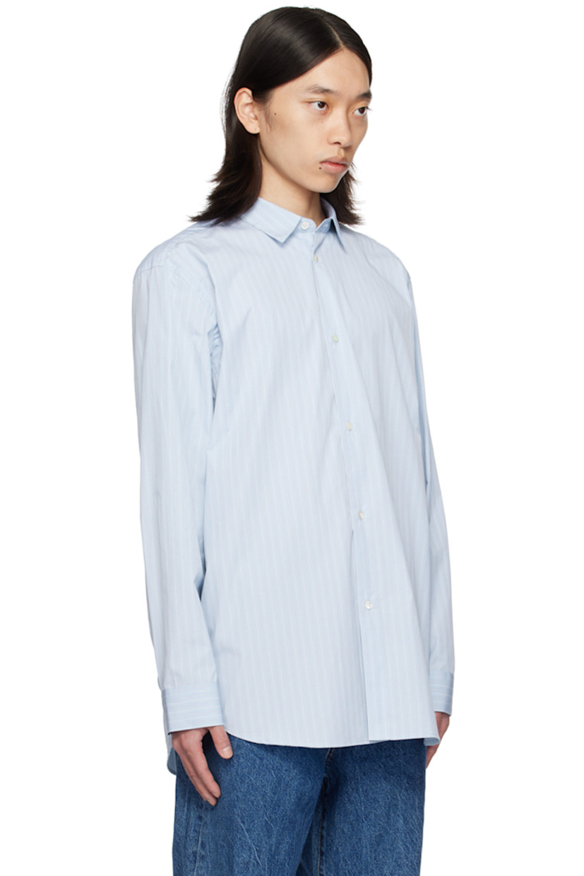 Cotton poplin shirt. Stripes throughout. 

· Spread collar
· Button closure
· Shirttail hem
· Logo flag at side seam
· Single-button barrel cuffs
· Box pleat at back yoke
· Mother-of-pearl hardware

Supplier color: Sky blue/White