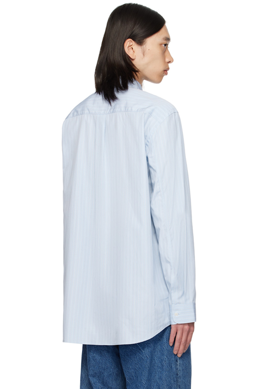 Cotton poplin shirt. Stripes throughout. 

· Spread collar
· Button closure
· Shirttail hem
· Logo flag at side seam
· Single-button barrel cuffs
· Box pleat at back yoke
· Mother-of-pearl hardware

Supplier color: Sky blue/White