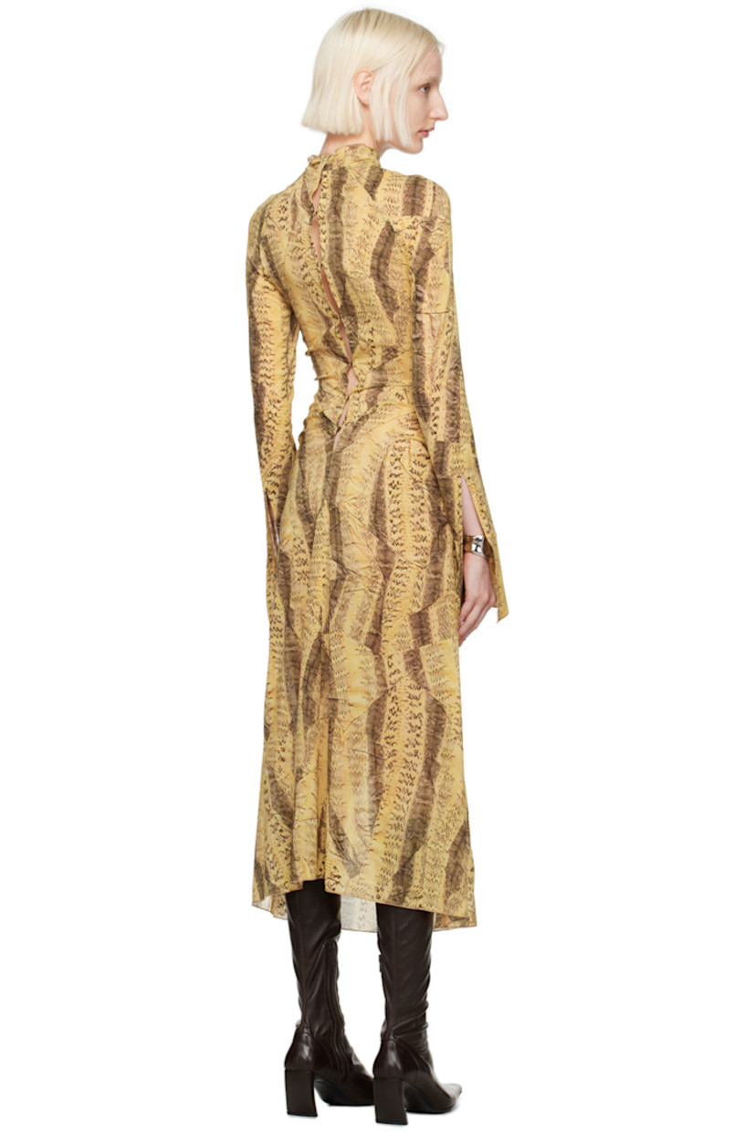 Stretch silk chiffon dress. Snakeskin pattern printed throughout.

· Mock neck
· Ruching at side seams and raglan sleeves
· Slit at side seams and flared cuffs
· Hook-eye closure at back
· Unlined

Supplier color: Crushed snake