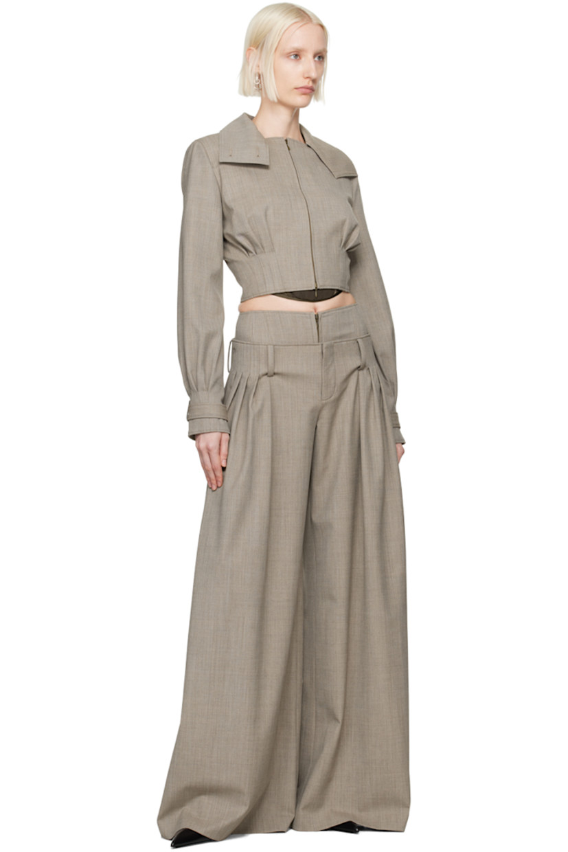 Wool sharkskin jacket.

· Funnel neck converts to spread collar
· Button fastenings at collar
· Two-way zip closure
· Pleats at cropped hem
· Padded shoulders
· Loop and detachable button tab at cuffs
· Full viscose-blend twill lining

Supplier color: Grey