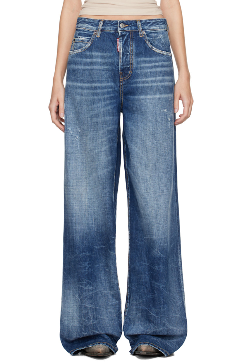 Loose-fit non-stretch denim jeans. Fading, whiskering, and distressing throughout. 

· Belt loops
· Five-pocket styling
· Logo flag at button-fly
· Loop and suede logo patch at back waistband 
· Logo-engraved antiqued bronze-tone hardware
· Contrast stitching in tan 

Supplier color: Navy