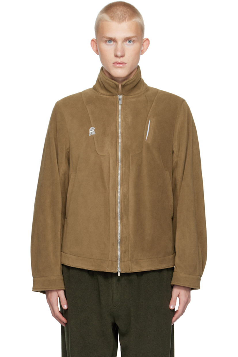 Polartec® polyester fleece jacket.

· Spread collar
· Two-way zip closure
· Logo graphic embroidered at chest
· Welt pockets
· Adjustable single-button barrel cuffs
· Locker loop at back collar
· Patch pockets at interior
· Full cotton poplin lining
· Logo-engraved silver-tone hardware

Supplier color: Beige