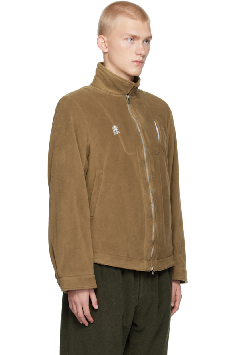 Polartec® polyester fleece jacket.

· Spread collar
· Two-way zip closure
· Logo graphic embroidered at chest
· Welt pockets
· Adjustable single-button barrel cuffs
· Locker loop at back collar
· Patch pockets at interior
· Full cotton poplin lining
· Logo-engraved silver-tone hardware

Supplier color: Beige