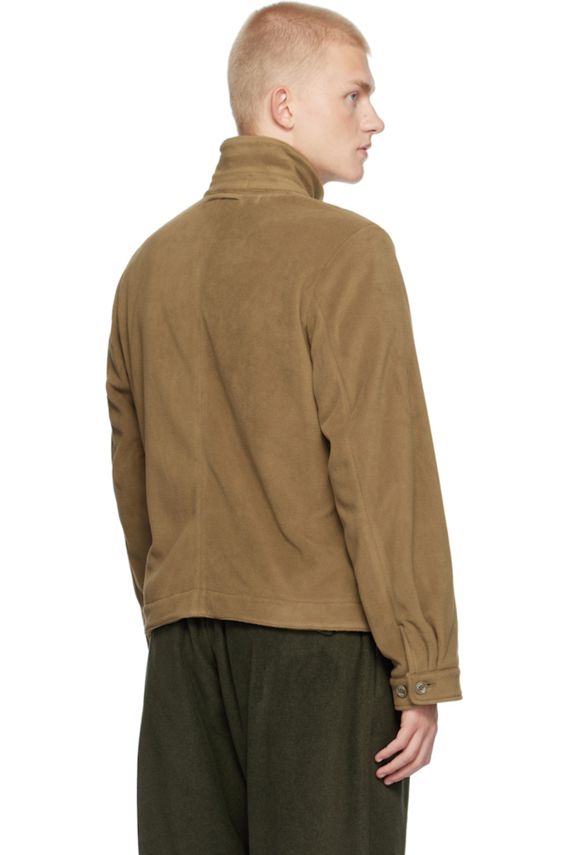 Polartec® polyester fleece jacket.

· Spread collar
· Two-way zip closure
· Logo graphic embroidered at chest
· Welt pockets
· Adjustable single-button barrel cuffs
· Locker loop at back collar
· Patch pockets at interior
· Full cotton poplin lining
· Logo-engraved silver-tone hardware

Supplier color: Beige