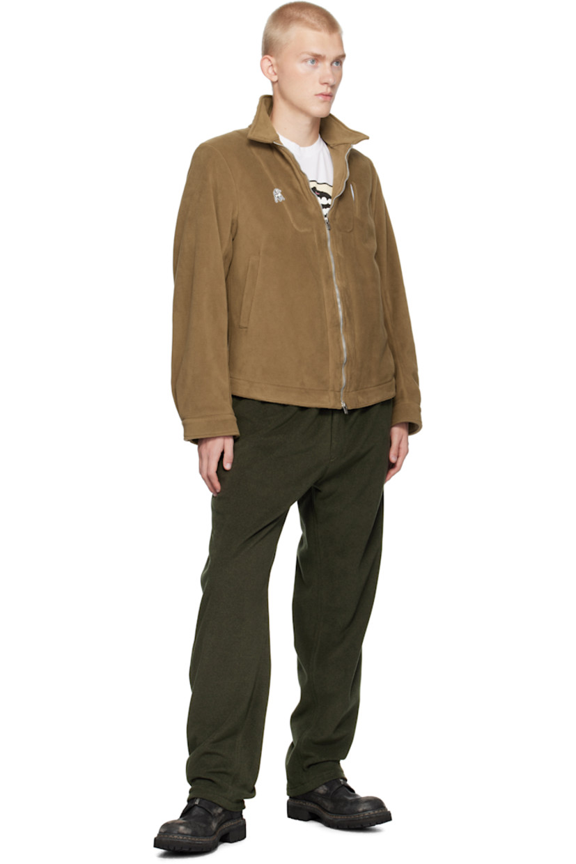 Polartec® polyester fleece jacket.

· Spread collar
· Two-way zip closure
· Logo graphic embroidered at chest
· Welt pockets
· Adjustable single-button barrel cuffs
· Locker loop at back collar
· Patch pockets at interior
· Full cotton poplin lining
· Logo-engraved silver-tone hardware

Supplier color: Beige