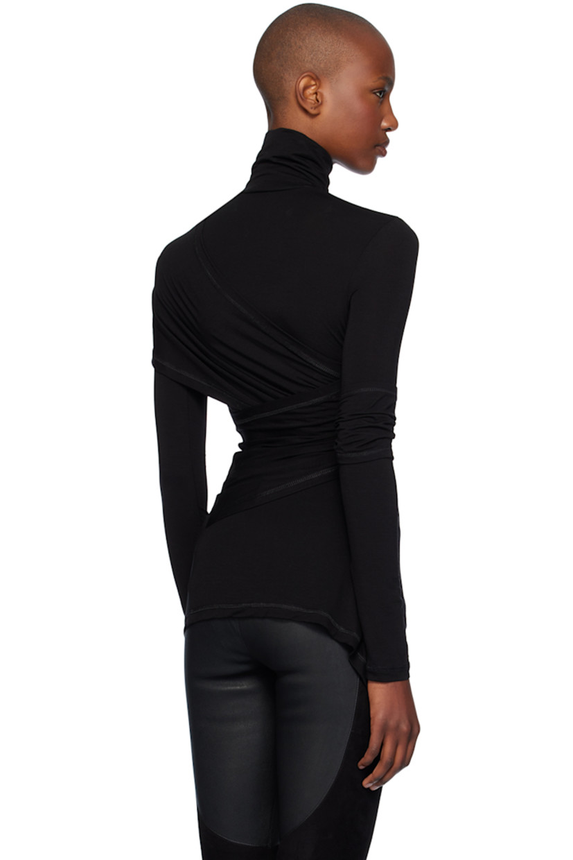 Stretch lyocell jersey turtleneck. Draping throughout.

· Wrap construction
· Asymmetric hem
· Ruched panel at sleeve
· Cutouts at back

Supplier color: Black