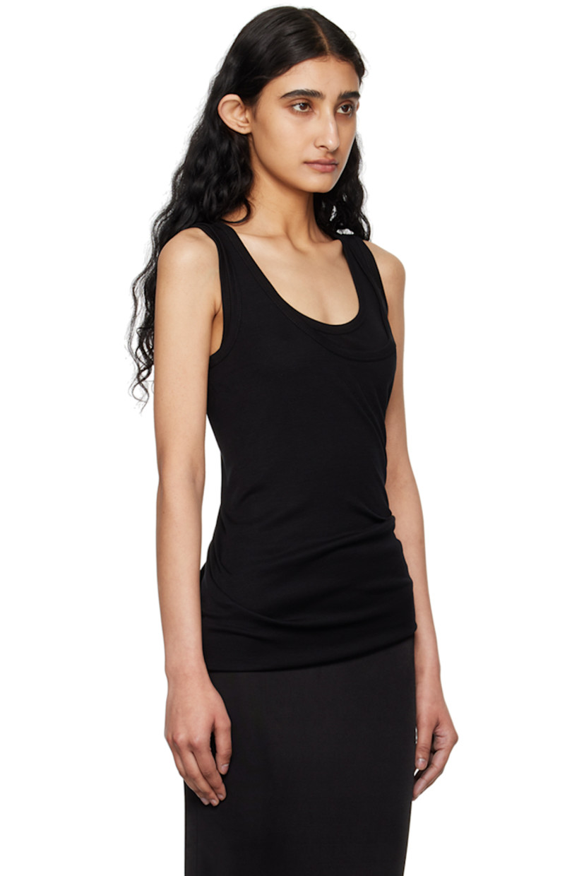 Ribbed lyocell jersey tank top. Converts to midi dress.

· Layered construction
· Scoop neck 
· Cutout at twisted side seam
· Button fastening at shoulders for alternate styling

Supplier color: Black