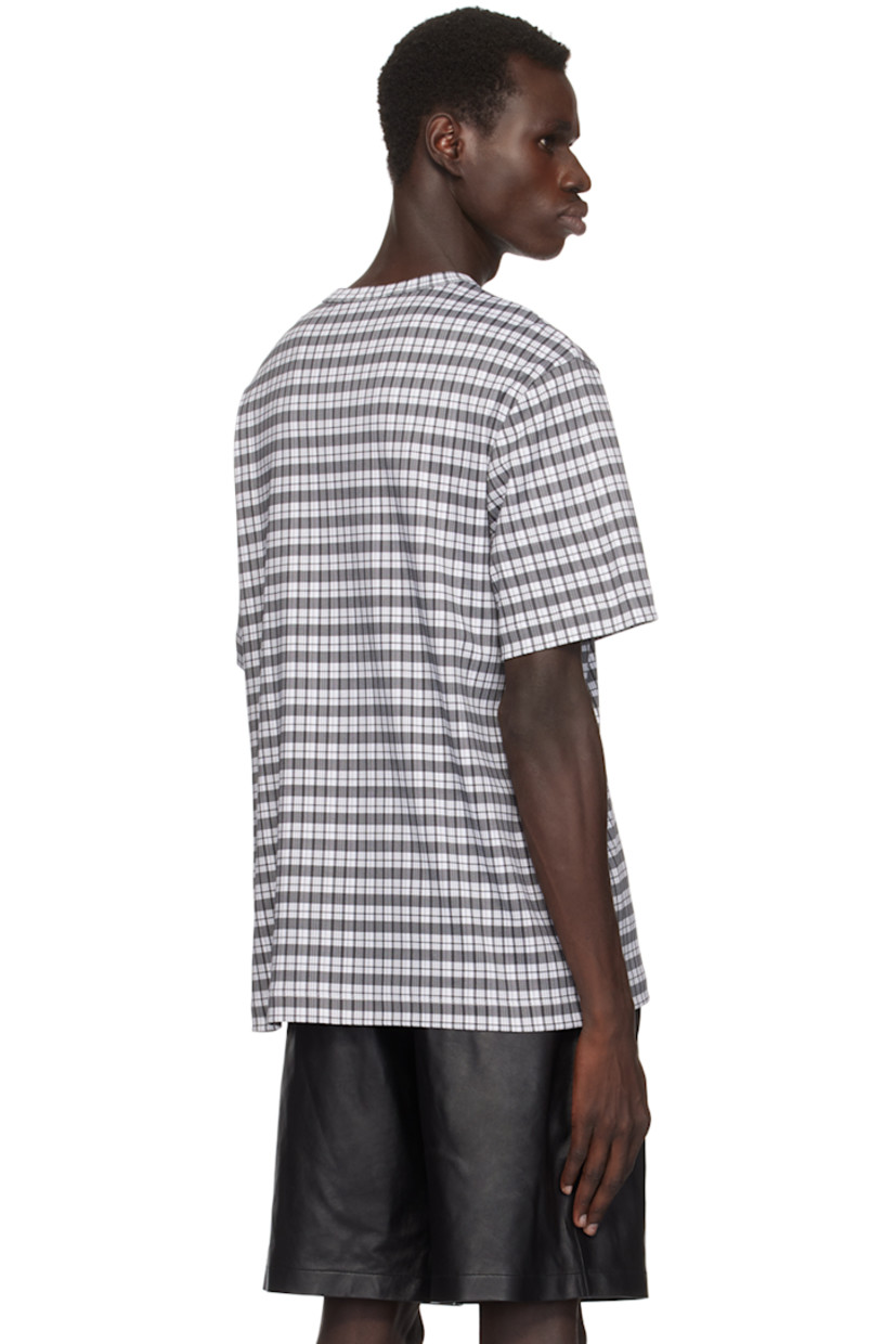 Cotton jersey T-shirt. Check pattern printed throughout.

· Relaxed-fit
· Rib-knit crewneck
· Logo embroidered at chest

Supplier color: Check black