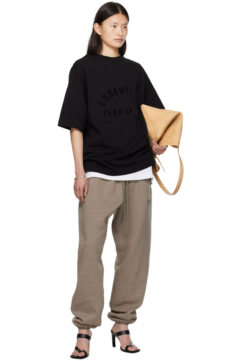 Cotton jersey T-shirt.

· Rib knit crewneck
· Logo bonded at front
· Dropped shoulders
· Rubberized logo patch at back collar

Part of the Core Collection.

Supplier color: Black