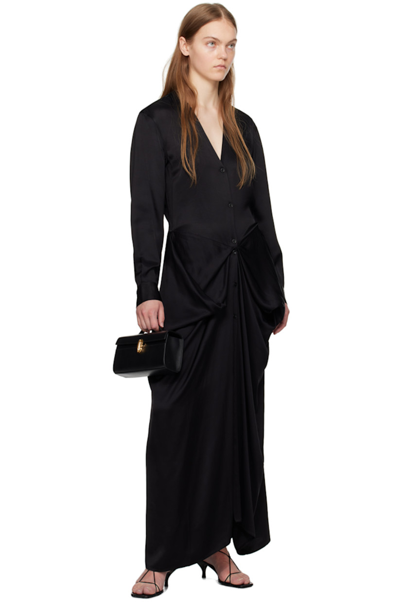 Buffed calfskin top handle bag in black.

· Fixed carry handle
· Turn-lock flap
· Card slot at interior
· H4.75" x W8.5" x D2"

Supplier color: Black